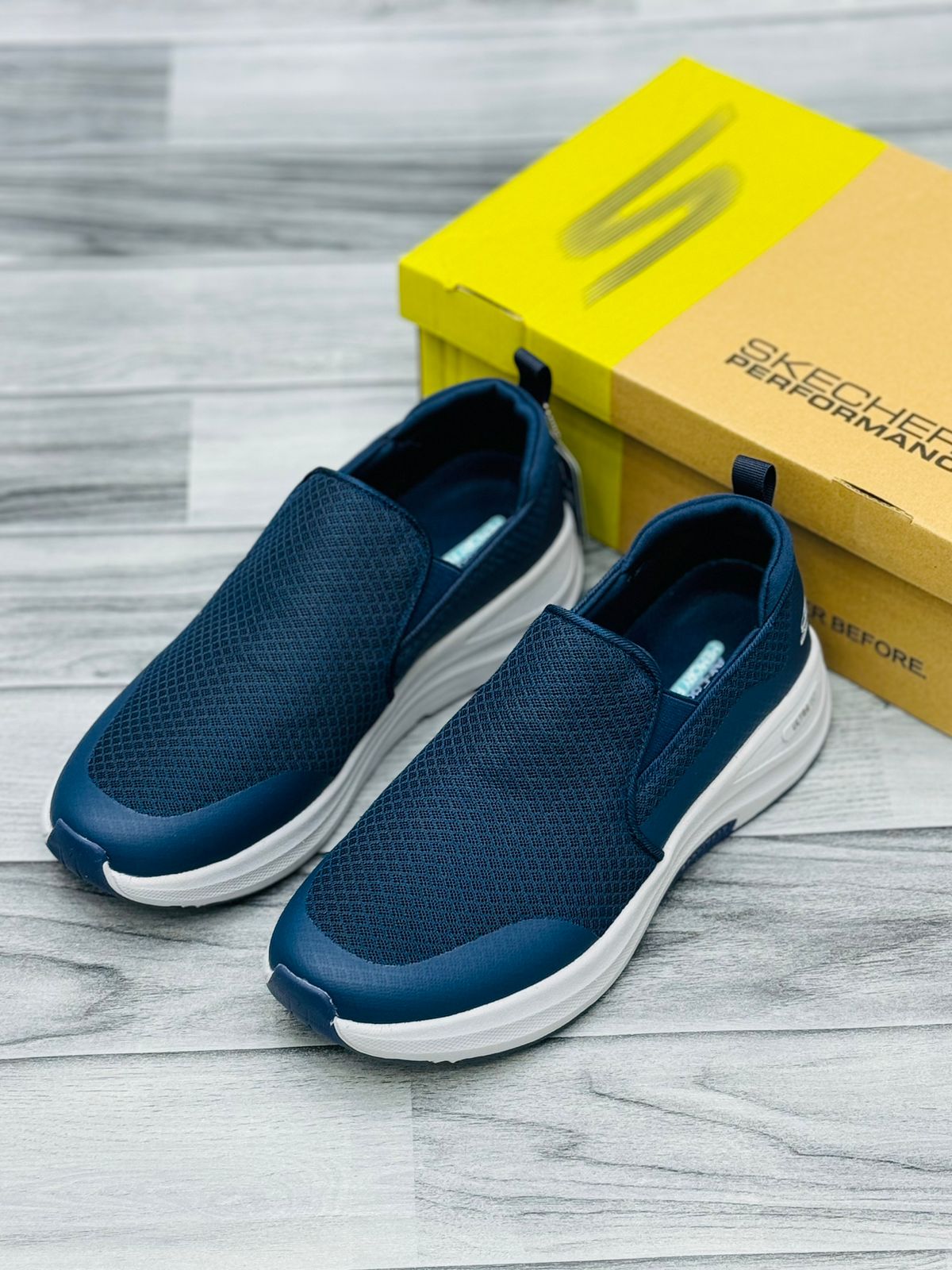 Buy Skechers Go Walk Arch Fit Sneakers price in Pakistan.