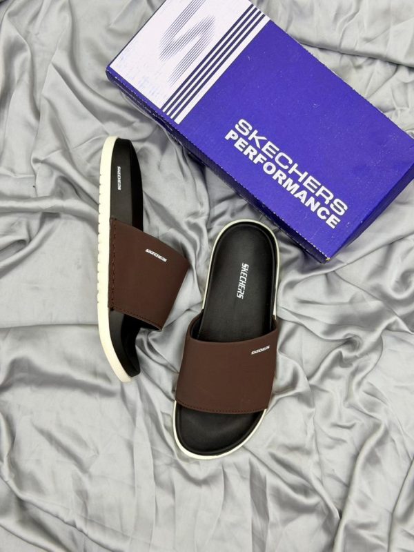 Red sandals with black soles.